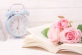 Pastel artificial rose and open book with vintage tone Royalty Free Stock Photo