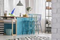 Pastel barstools in colorful kitchen