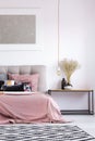 Pastel bedroom with copper lamp Royalty Free Stock Photo