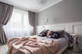 Pastel bedroom with double bed Royalty Free Stock Photo