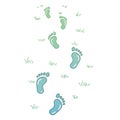 Pastel Blue and Green Footprints on Grass Background Royalty Free Stock Photo