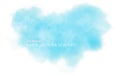 Pastel blue watercolor blob on the white paper background. Paint brusch template.