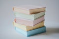 Pastel Book Stack: A Serene Study Still Life Royalty Free Stock Photo