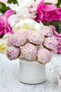 Pastel cake pops on rustic wooden table Royalty Free Stock Photo