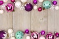 Pastel Christmas bauble double border on rustic white wood Royalty Free Stock Photo