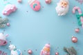 Pastel Christmas border frame on light blue background with Santa, bear, and Nutcracker ornaments Royalty Free Stock Photo
