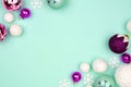 Pastel Christmas ornament double corner border over a turquoise background Royalty Free Stock Photo