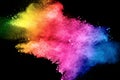 Pastel color dust particle splashing.Colorful powder explosion on blackackground