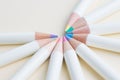 Pastel color pencils arrange in circle with copy space on light