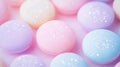 Pastel colored bath bombs or macarons with glitter on soft pink background Royalty Free Stock Photo