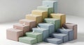 Pastel colored cubes with feathers on top Royalty Free Stock Photo
