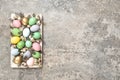 Pastel colored Easter eggs decoration stone background Royalty Free Stock Photo