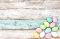 Pastel colored easter eggs wooden background Royalty Free Stock Photo