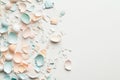 Pastel colored eggshells scattered creatively on a white background Royalty Free Stock Photo