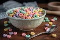 Pastel colored froot loops with small spoon. Delicious fruit cereal rings. Generative AI