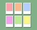 Pastel colored instant film frames on a light green background