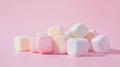 Pastel colored marshmallows on pink background, minimalist candy concept Royalty Free Stock Photo