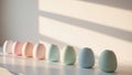 Pastel Colored Objects in a Row with Sunlight. Royalty Free Stock Photo