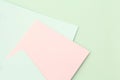 Pastel colored paper sheets, blank background Royalty Free Stock Photo