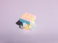 pastel-colored Rubik\'s cube in a twisted position Royalty Free Stock Photo