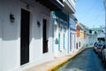 Pastel colored Spanish colonial buildings along Old San Juan Puerto Rico street