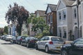 Pastel-colored terraced houses on White Hart Lane in Barnes, London