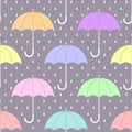 Pastel colored umbrellas on gray with rain drops, seamless pattern, vector Royalty Free Stock Photo