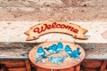 Pastel colored Wood sign written Welcome Royalty Free Stock Photo