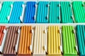 Pastel colors of modeling clay. Multicolored plasticine bars ina box, background texture