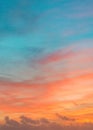 Pastel colors ocean sunset, warm and cyan clouds sky