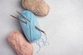 Pastel colors yarn and wooden needles Royalty Free Stock Photo