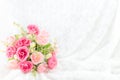 Pastel Coloured Artificial Pink Rose on white fur background Royalty Free Stock Photo