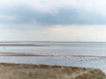 Pastel coloured beach view over low tide at Shoeburyness