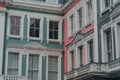 Pastel coloured terraced houses in Primrose Hill, London, UK