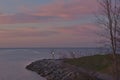 Pastel contrasts in the predawn light over Lake Ontario