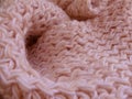Pastel coral knitting texture background. Cozy scandinavian minimalism