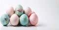 Pastel decorated easter eggs with floral patterns on white background, copy space Royalty Free Stock Photo
