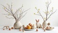 Pastel easter decor with eggs, bunny, and spring blossoms Royalty Free Stock Photo