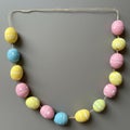 Pastel Easter Egg Garland on Gray Background Royalty Free Stock Photo