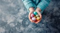 Pastel Easter Eggs in Child\'s Palms