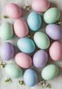 Pastel Easter Eggs and Spring Blossoms on Fabric Royalty Free Stock Photo