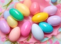 Pastel Easter Palette. A visually pleasing composition featuring a gradient of pastel-colored Easter decorations such as