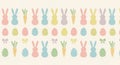 Pastel Easter Pattern with Bunnies Carrots and Eggs Seamless Decorative Repeating Design for Textile or Backgrounds Royalty Free Stock Photo