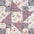 Pastel geometric patchwork block from pieces of fabrics, detail of quilt, close-up