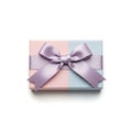 Pastel gift box with purple ribbon Royalty Free Stock Photo