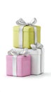 Pastel gift boxes with silver ribbons in pink, white, and green stack Royalty Free Stock Photo