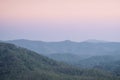 Pastel gradient sky with mountain