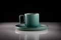 Pastel green colored coffee or tea cup with hot liquid, smoke and steam, black background Royalty Free Stock Photo