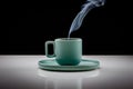 Pastel green colored coffee or tea cup with hot liquid, smoke and steam, black background Royalty Free Stock Photo