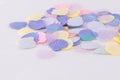 Pastel colours iridescent shell confetti isolated on white